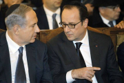 Benjamin Netanyahu y Francois Hollande en la Gran Sinagoga de París.-Foto: REUTERS