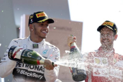 Lewis Hamilton celebra su victoria en el GP de Italia celebrado este domingo en Monza.-REUTERS / MAX ROSSI