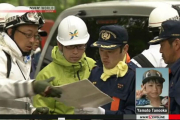 Agentes de policía buscan al pequeño Yamato Tanooka, en la esquina inferior derecha.-NHK