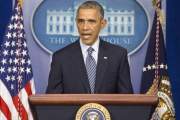 Obama habla ante los medios en la Casa Blanca poco después de conocerse el veredicto en Ferguson.-Foto: AP / JACQUELYN MARTIN