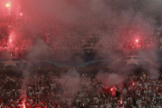 Aspecto de una grada del estadio del Liga durante el encuentro ante el Dotmund.-AP / CZAREK SOKOLOWSKI