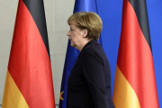 Angela Merkel tras la comparecencia.-Foto: TOBIAS SCHWARZ / AFP