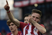 Saúl Ñíguez celebra el gol que dio la victoria al Atlético contra el Las Palmas, este sábado.-AFP / JAVIER SORIANO