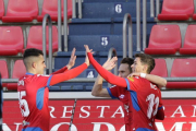 Oyarzun, Nacho y David Rodríguez quieren seguir celebrando goles y victorias del Numancia.-Luis Ángel Tejedor