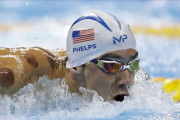 Michael Phelps, con unas visibles marcas rojas en su piel, en las series de los 200 mariposa.-Michael Sohn / AP