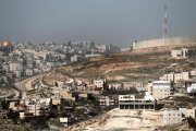 El polémico muro que Israel ha construído en Jerusalén Este.-THOMAS COEX (AFP)