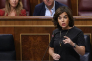 La vicepresidenta, Soraya Sáenz de Santamaría, durante la sesión de control al Gobierno en el Congreso, el 12 de julio.-JUAN MANUEL PRATS