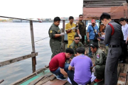 Agentes de policía de Tailandia, junto al lugar del hallazgo del cuerpo del ejecutivo catalán en Bangkok.-EFE