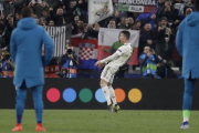 El gesto de Cristiano Ronaldo tras acabar el partido en el que eliminó al Atlético con tres goles.-AP / LUCA BRUNO
