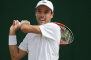 Roberto Bautista, en ación en Wimbledon ante Cilic.-AP /DANIEL LEAL-OLIVAS