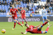 El Numancia se trajo un empate de su visita a Riazor tras remontar dos goles en contra.-HDS