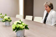 Theresa May, en uno de los momentos de la cumbre en Bruselas.-AFP / GEERT VANDEN WIJNGAERT