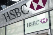Un cliente entre en una sucursal del HSBC en Londres.-AFP / JUSTIN TALLIN