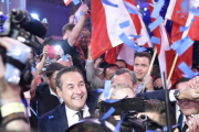 Heinz-Christian Strache celebra el éxito de la ultraderecha en la noche electoral, en Viena.-AFP / HANS PUNZ