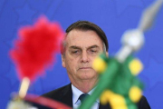 Bolsonaro preside una ceremonia militar este viernes en el Palacio Planalto.-AFP / EVARISTO SA