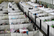 Instalaciones para refugiados en el antiguo aeropuerto de Tempelhof (Berlín).-FIRMA DE FOTO