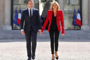 El matrimonio Macron, a su llegada al Palacio del Elíseo para un acto institucional-AFP / THIBAULT CAMUS