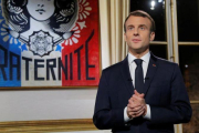 El presidente francés, Emmanuel Macron, durante su mensaje de Fin de Año.-MICHEL EULER (REUTERS)
