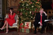 El presidente de EEUU, Donald Trump, y su esposa, Melania, en su club de Mar-a-Lago, en Florida.-NICHOLAS KAMM / AFP