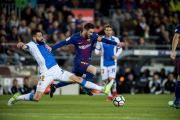 Messi, en acción, en un partido en el que ha conseguido tres goles, los tres del Barça.-JORDI COTRINA