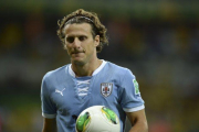 Forlán se retiró de la selección mucho antes de dejar el fútbol, en el 2015.-AP