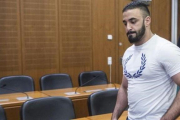 El acusado Aria L. entra en una sala del Tribunal Superior de Justicia de Francfort.-EFE / BORIS ROESSLER