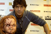 El creador de Chucky, Don Mancini, junto al muñeco en la presentación de la película La semilla de Chucky.-DIEGO CALDERON