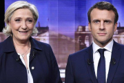 Marine Le Pen y Emmanuel Macron.-ERIC FEFERBERG POOL (AP)