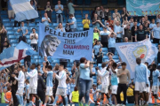 La afición del Manchester City, durante el último encuentro de Premier en casa-AFP / OLI SCARFF