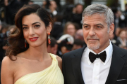 El matrimonio George Clooney y Amal Alamuddin, en el Festival de Cannes del 2016.-AFP / ALBERTO PIZZOLI