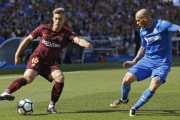 Deulofeu, durante una acción en campo del Getafe.-AP / FRANCISCO SECO