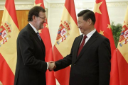 Mariano Rajoy saluda al presidente chino, Xi Jinping, en septiembre del 2014.-Foto: EFE