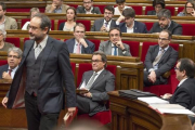 El diputado de la CUP Antonio Baños, durante el segundo debate de investidura en el Parlament.-FERRAN SENDRA