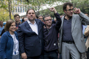 Carme Forcadell y Oriol Junqueras, junto a Josep Maria Jové y Lluís Salvadó, el 20 de septiembre del 2017.-JOAN PUIG