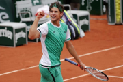 Thiem celebra la victoria ante Djokovic.-AP / CHRISTOPHE ENA