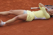 Garbiñe Muguruza, instantes después de lograr su mejor triunfo.-AP / DAVID VINCENT