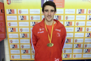 Daniel Arancón con el oro como ganador de la prueba de heptatlón.-Caep Soria