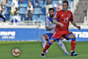 David Rodríguez, en una acción de juego durante el partido del pasado domingo en Tenerife.-ÁREA 11