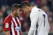 Koke y Cristiano Ronaldo, encarados en el derbi del pasado sábado.-EFE / CHEMA MOYA