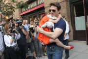 El actor Tom Cruise con su hija Suri, en julio del 2012.-Foto: MEHDI TAAMALLAH / AFP