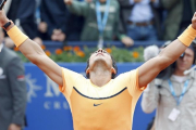 Rafael Nadal celebrando un punto conseguido en la pasada edición del Barcelona Open Banc Sabadell.-ANDREU DALMAU