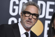 Alfonso Cuarón y su película Roma se llevaron los premios a mejor director y mejor película extranjera, respectivamente.-INVISION