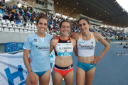 Marta Pérez, Esther Guerrro y Solange Pereira, al término del 1.500, ayer, en Huelva.-RFEA