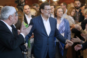 El líder del PP, Mariano Rajoy, en una convención sobre educación de su partido este sábado en Zaragoza.-EFE / JAVIER BELVER