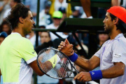 Rafael Nadal felicita a Fernando Verdasco tras caer ante el madrileño en tercera ronda del Master 1.000 de Miami.-Foto: AFP / AL BELLO