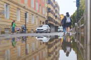 Estado de la calle Alfonso VIII esta mañana durante la tromba de agua.