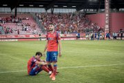 Marc Fuentes, junto a Danese, desolado tras el final del partido.