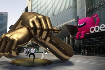 Imagen generada por ordenador que muestra la futura escultura de metal dedicada a Psy y su vídeo de la canción 'Gangnam style'.-AFP
