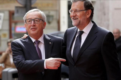 Jean Claude Juncker y Mariano Rajoy, en Madrid en octubre del 2015.-