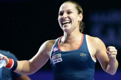 Cibulkova celebra efusivamente su victoria sobre Kuznetsova.-AFP / ROSLAN RAHMAN